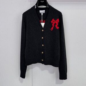 Ganni Black V-Neck Sweater with Red Accent